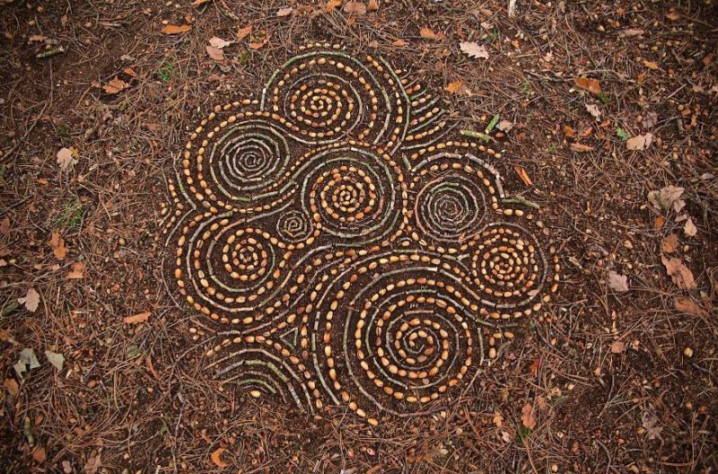 Artist spends hours organizing natural objects into detailed mandalas &amp; cairns