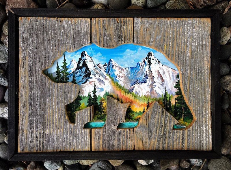 Breathtaking landscapes paintings emerge from intricately carved wood